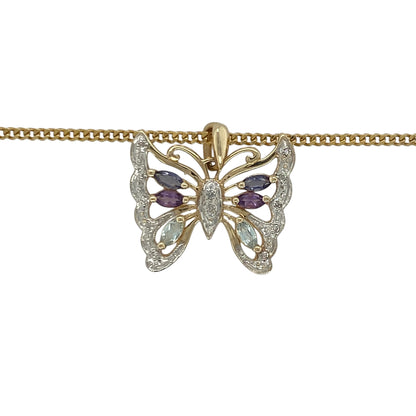 Add a touch of colour, sparkle, and graceful beauty to your jewellery collection with this pre-owned 9ct yellow gold diamond, amethyst and blue topaz butterfly pendant necklace, featuring a charming gemstone design with timeless appeal—perfect for gifting, special occasions, or everyday wear.

Design: The necklace features a beautifully crafted butterfly pendant measuring approximately 2cm long including the bail.
