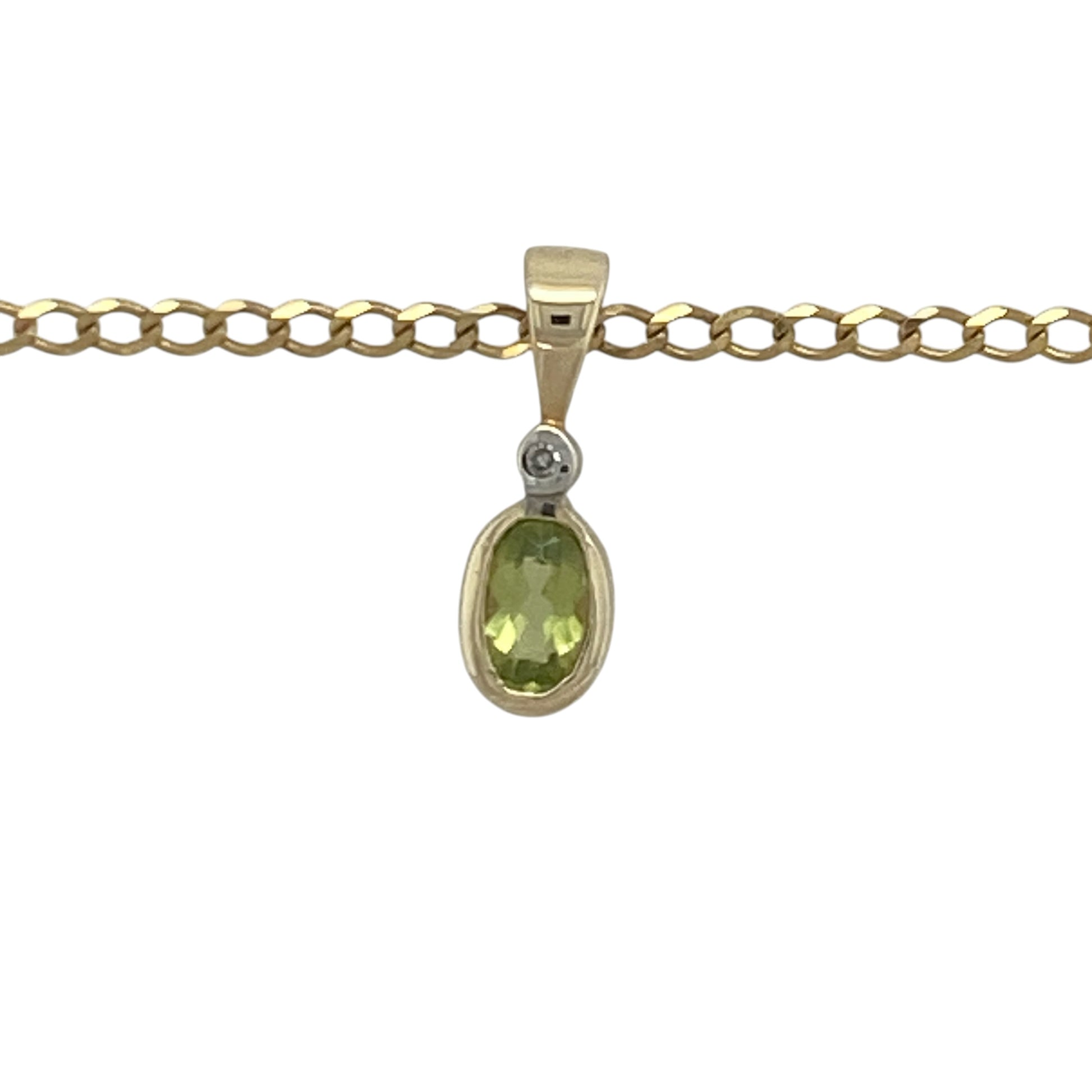 Add a touch of fresh colour and timeless elegance to your jewellery collection with this pre-owned 9ct yellow gold diamond and peridot oval pendant necklace, featuring a classic gemstone design with refined everyday appeal—perfect for gifting, special occasions, or daily wear.

Design: The necklace features a delicate oval pendant measuring approximately 1.3cm long including the bail.