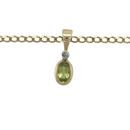 Add a touch of fresh colour and timeless elegance to your jewellery collection with this pre-owned 9ct yellow gold diamond and peridot oval pendant necklace, featuring a classic gemstone design with refined everyday appeal—perfect for gifting, special occasions, or daily wear.

Design: The necklace features a delicate oval pendant measuring approximately 1.3cm long including the bail.