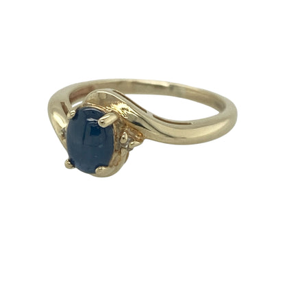 Add a touch of classic elegance and vibrant colour to your jewellery collection with this pre-owned 9ct yellow gold blue stone ring, featuring a timeless gemstone design with versatile everyday appeal—perfect for gifting, special occasions, or daily wear.

Design: The ring showcases a beautiful oval blue stone measuring approximately 7mm by 5mm, creating an elegant focal point with its rich and eye-catching colour.