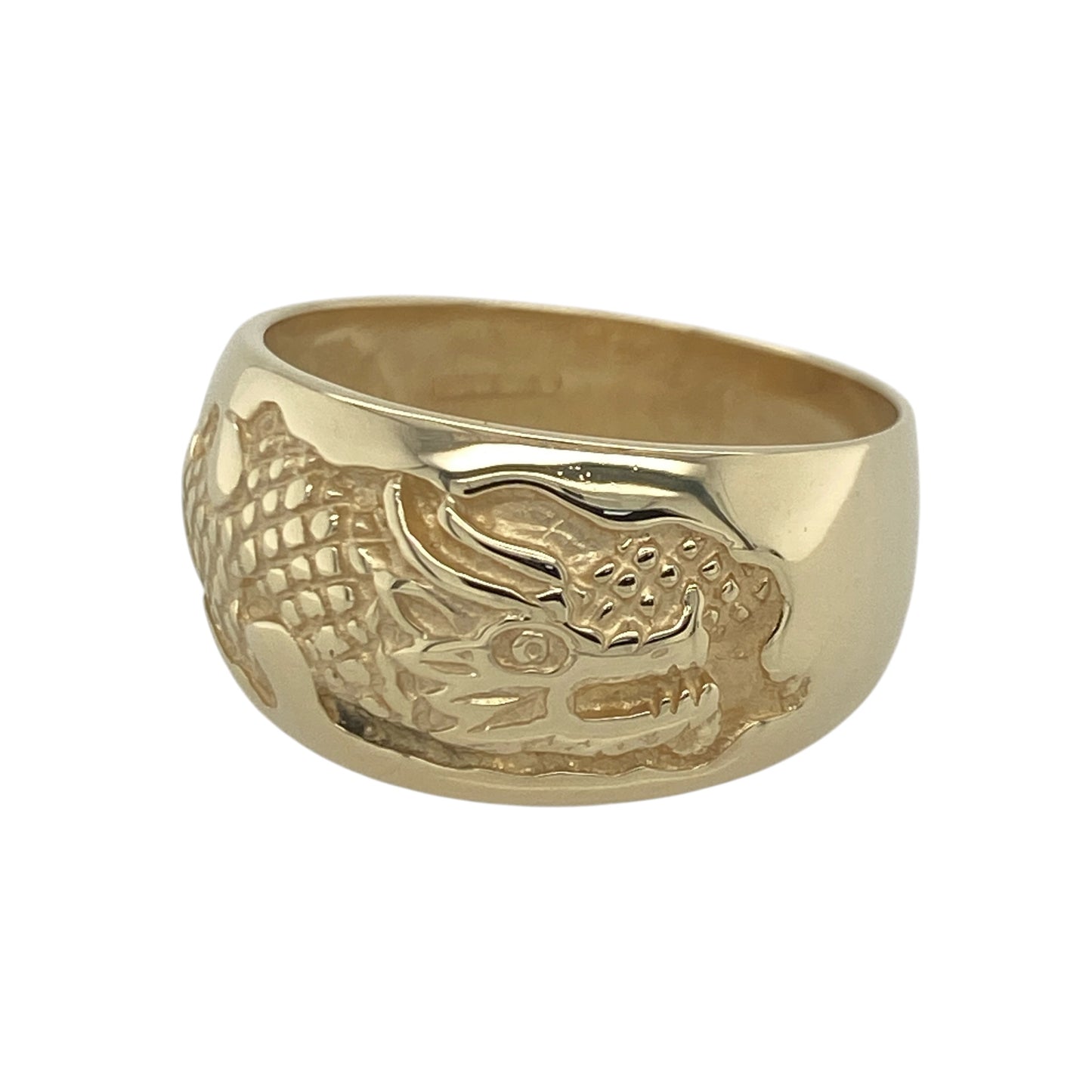 Make a bold statement with this pre-owned 9ct yellow gold dragon band ring, featuring an impressive mythical design with striking detail and timeless appeal—perfect for collectors, fantasy enthusiasts, or anyone seeking a distinctive piece of jewellery.

Design: The ring showcases an intricate dragon-themed design across a wide band measuring approximately 12mm at the front.