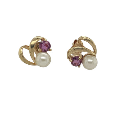 Add a touch of romance and classic elegance to your jewellery collection with these pre-owned 9ct yellow gold ruby and pearl heart stud earrings, featuring a charming gemstone design with timeless appeal—perfect for gifting, special occasions, or everyday wear.

Design: The earrings showcase a beautiful heart-inspired design, combining lustrous pearls measuring approximately 5mm in diameter with vibrant rubies measuring approximately 3mm in diameter.