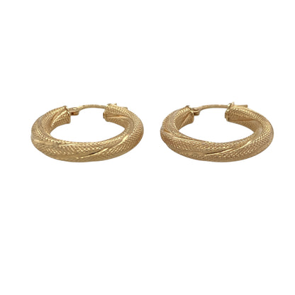 Add a touch of timeless elegance to your jewellery collection with these pre-owned 9ct yellow gold textured twisted hoop creole earrings, featuring a classic design with beautiful detailing and versatile appeal—perfect for everyday wear, special occasions, or gifting.

Design: The earrings showcase an attractive twisted hoop creole design enhanced by textured detailing that catches and reflects the light beautifully.