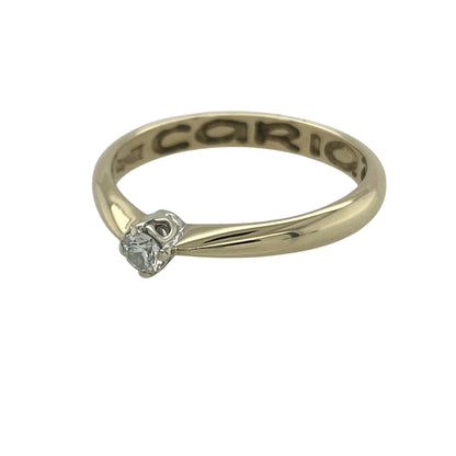 Celebrate timeless romance and elegant simplicity with this pre-owned 9ct yellow gold and diamond Clogau Cariad solitaire ring. Featuring a sparkling brilliant-cut diamond and the distinctive Cariad design, this beautiful ring is perfect as a gift, promise ring, engagement ring, or a cherished addition to any jewellery collection.

Design: The ring features a single brilliant-cut diamond of approximately 0.10ct, presented in the iconic Clogau Cariad style.