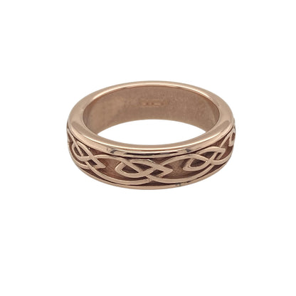 Add symbolic heritage and timeless style to your collection with this pre-owned 9ct rose gold Clogau Annwyl Celtic knot band ring—elegant, meaningful, and rich in Welsh tradition.

Design: The ring features an intricate Celtic knot pattern encircling the 5mm wide band, representing love, loyalty, and eternity.
Material: Made from 9-carat rose gold, the polished finish brings warmth and depth to the detailed knotwork, reflecting the signature Clogau craftsmanship.