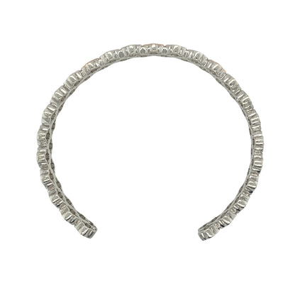 Add a touch of elegance and good fortune to your jewellery collection with this pre-owned Clogau open clover style cuff bangle in sterling silver and 9ct rose gold. Featuring a beautifully detailed openwork clover-inspired design, this eye-catching bangle combines contemporary style with the distinctive Welsh heritage associated with Clogau jewellery.

Design: The bangle showcases an elegant open clover style motif to the front, symbolising luck, prosperity, and positivity.
