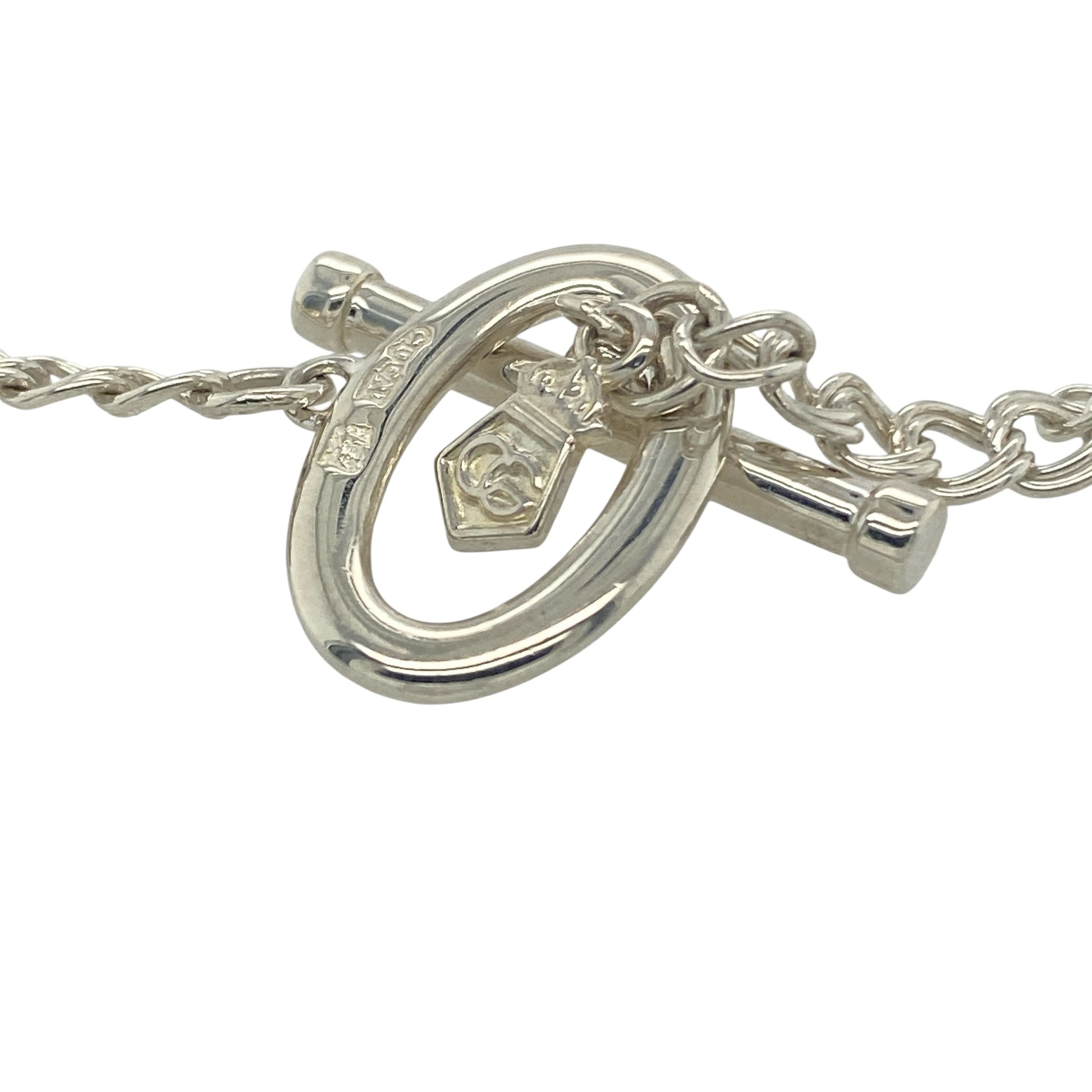 Celebrate love and Welsh heritage with this pre-owned Clogau 'Take My Heart' Cariad bracelet in sterling silver and 9ct rose gold. Featuring a beautifully detailed round pendant and a substantial double curb chain design, this elegant bracelet is perfect as a meaningful gift or a treasured addition to any Clogau jewellery collection.

Design: The bracelet showcases Clogau's romantic 'Take My Heart' Cariad motif, centred around a beautifully detailed 20mm round pendant.