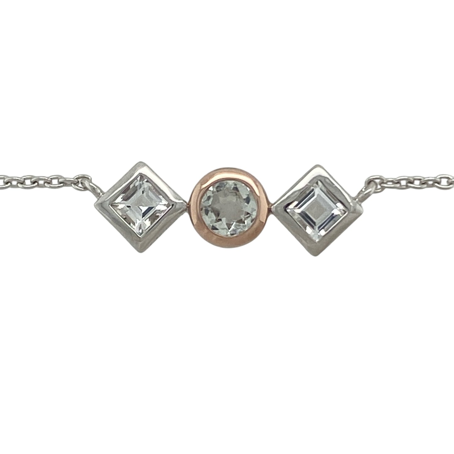 Add a touch of regal elegance to your jewellery collection with this pre-owned Clogau Welsh Royalty white topaz necklace in sterling silver. Featuring a sophisticated three-stone design with sparkling white topaz, this beautiful necklace is inspired by royal heritage and timeless style.

Design: The necklace showcases a classic three-stone arrangement, featuring a central round white topaz measuring 5mm in diameter, complemented by two square white topaz stones measuring approximately 4mm by 4mm each