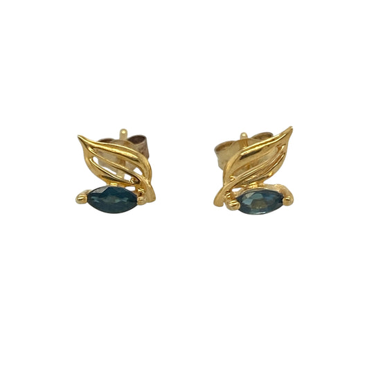 Add a delicate touch of colour and nature-inspired elegance to your jewellery collection with these pre-owned 9ct yellow gold sapphire fancy leaf style stud earrings. Featuring rich blue sapphire gemstones within an elegant leaf-inspired design, these charming earrings are perfect for everyday wear or as a thoughtful gift.

Design: The earrings showcase a graceful leaf style design, accented with marquise-cut blue sapphire stones measuring approximately 4mm by 2mm each.