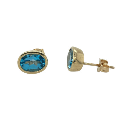 9ct Gold & Blue Topaz Oval Stud Earrings