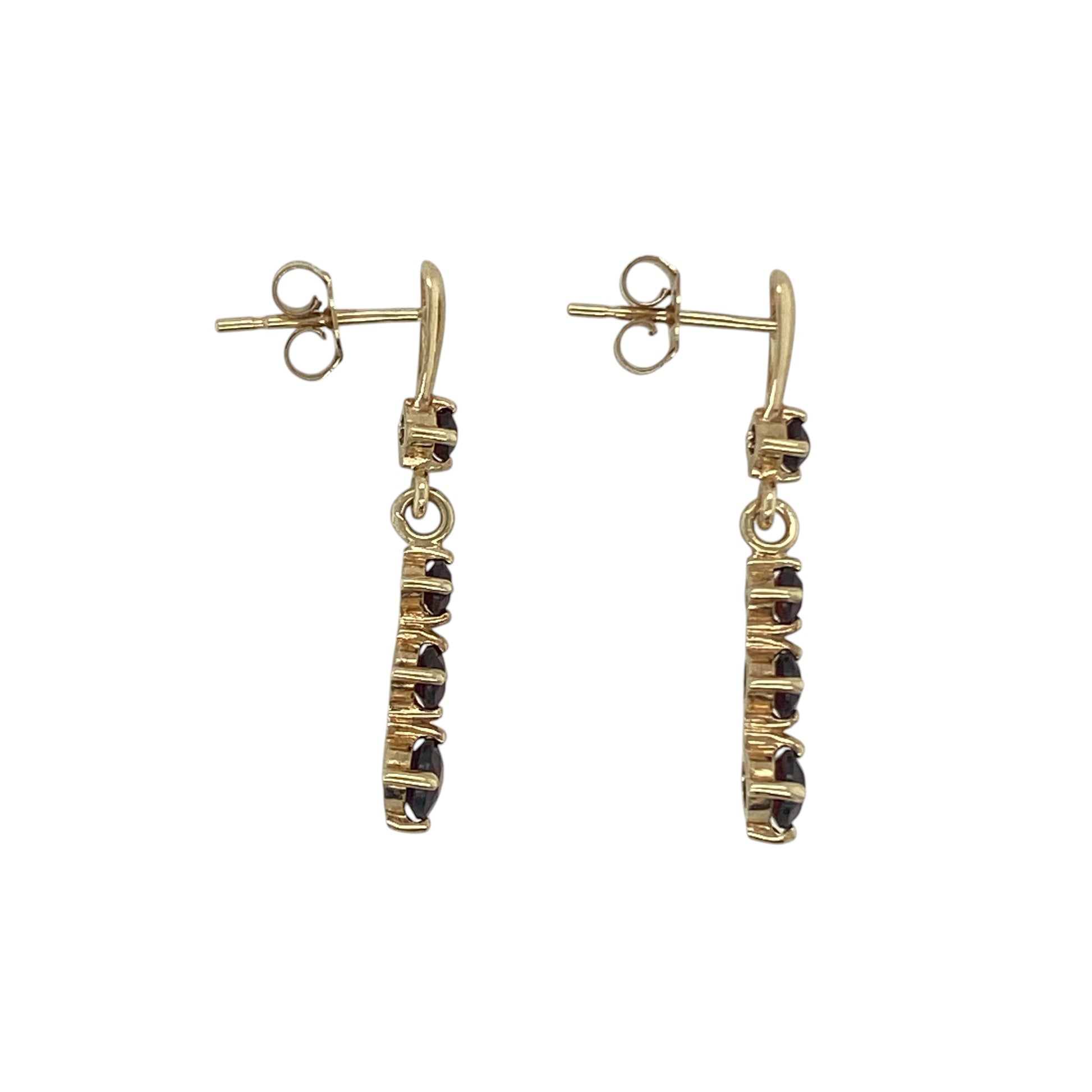 Add rich colour and timeless elegance to your jewellery collection with these pre-owned 9ct yellow gold garnet drop earrings. Featuring four round garnet gemstones in each earring, these elegant drops offer beautiful movement and deep red tones that are perfect for both everyday wear and special occasions.

Design: The earrings showcase a graceful drop design, each adorned with four round garnet stones arranged to create an eye-catching display of colour and sparkle.