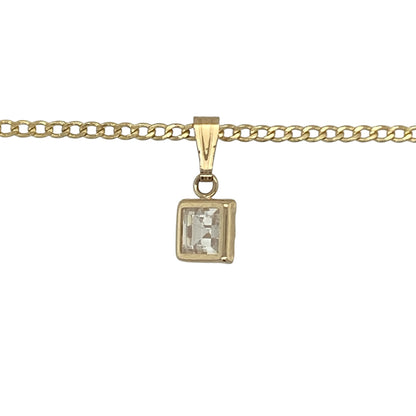Add classic sparkle and timeless elegance to your jewellery collection with this pre-owned 9ct yellow gold cubic zirconia solitaire pendant necklace. Featuring a striking square-cut cubic zirconia in a simple solitaire design, this elegant necklace is perfect for everyday wear or adding a touch of glamour to any occasion.

Design: The pendant showcases a sparkling square-cut cubic zirconia measuring approximately 5mm by 5mm, beautifully presented in a classic solitaire setting.