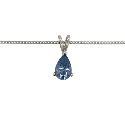 Add a touch of rare beauty and vibrant colour to your jewellery collection with this pre-owned 9ct white gold tanzanite pendant necklace. Featuring a stunning pear-cut tanzanite suspended from a classic curb chain, this elegant necklace is perfect for everyday luxury or special occasions.

Design: The pendant showcases a beautiful pear-cut tanzanite measuring approximately 8mm by 5mm, displaying the captivating violet-blue tones that make tanzanite one of the most sought-after gemstones.