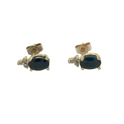 Add timeless colour and elegant sparkle to your jewellery collection with these pre-owned 9ct yellow gold diamond and sapphire stud earrings. Featuring rich blue sapphires complemented by sparkling diamonds, these classic earrings are perfect for everyday wear or special occasions.

Design: The earrings showcase oval-cut sapphire gemstones measuring approximately 6mm by 4mm each, displaying deep blue tones that beautifully catch the light.