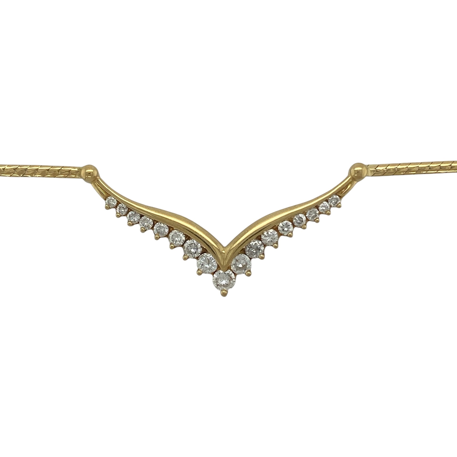 Make a striking statement with this pre-owned 18ct yellow gold diamond V style necklace, featuring an elegant diamond-set centrepiece and a luxurious flat snake chain. Combining substantial gold weight with impressive diamond content, this sophisticated necklace is perfect for special occasions and timeless everyday luxury.

Design: The necklace showcases a graceful V-shaped design adorned with sparkling diamonds, creating a flattering and eye-catching focal point at the neckline.