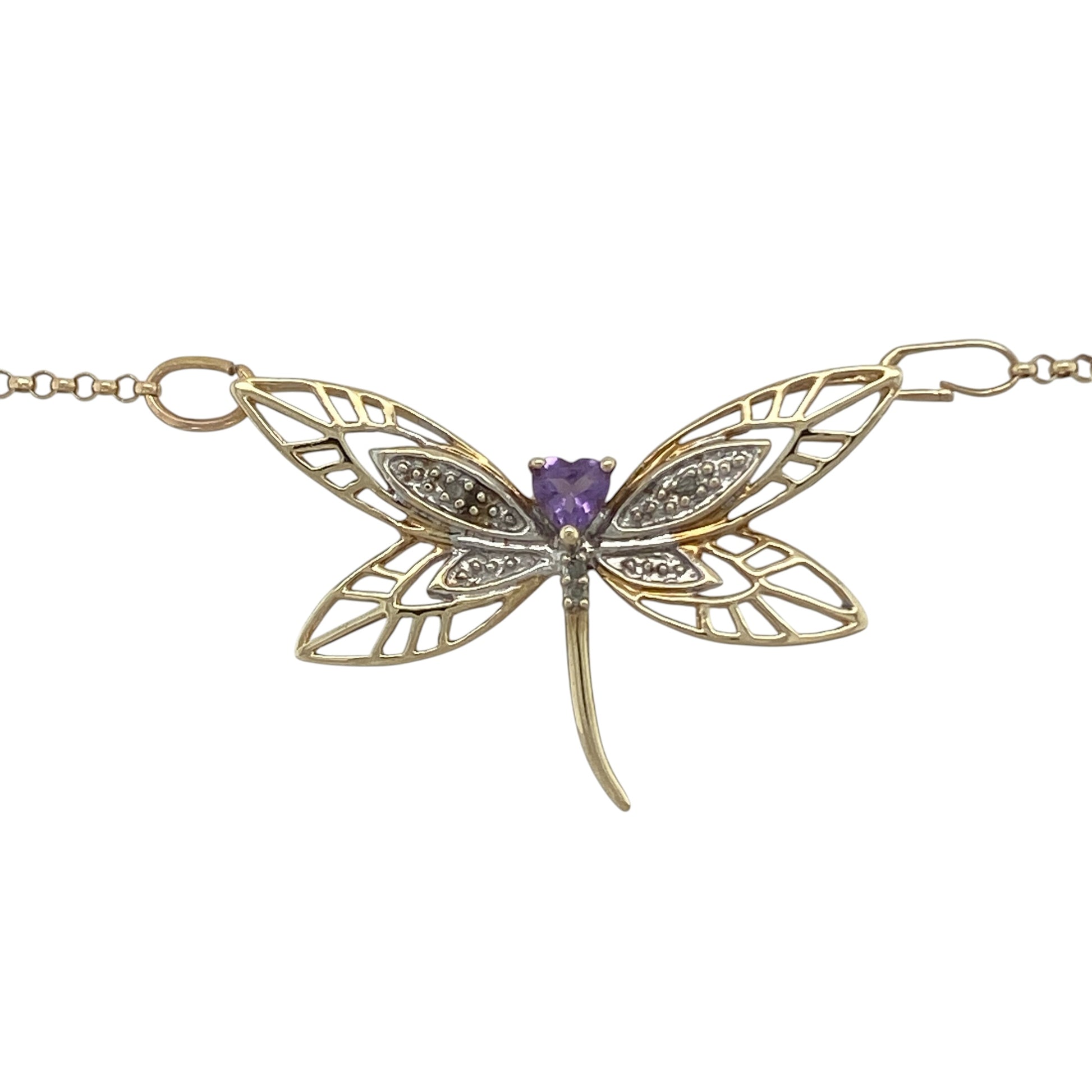 Add a touch of nature-inspired elegance to your jewellery collection with this pre-owned 9ct yellow and white gold diamond and amethyst dragonfly necklace. Featuring a beautifully detailed dragonfly design accented with sparkling diamonds and a heart-shaped amethyst, this distinctive necklace combines symbolism, colour, and timeless style.

Design: The necklace showcases an elegant dragonfly motif measuring approximately 34mm by 22mm.
