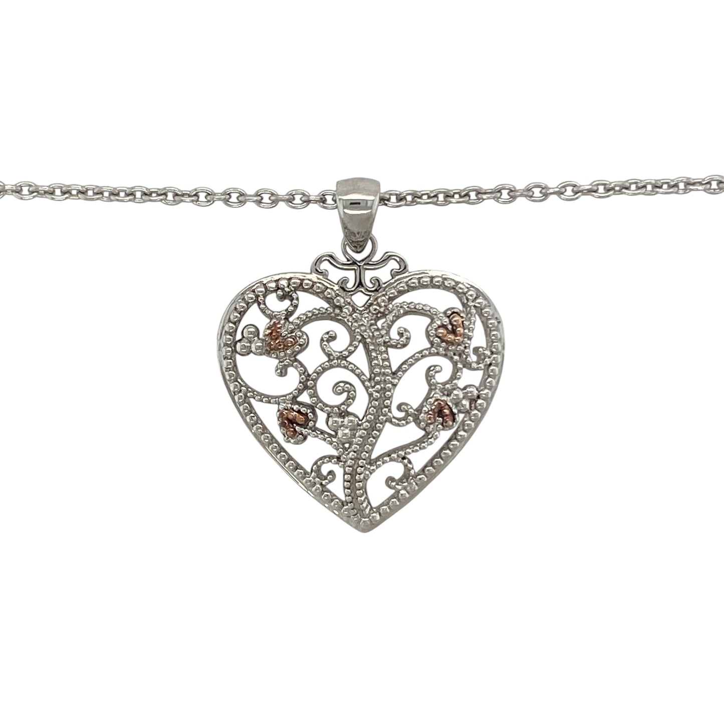 Celebrate love, family, and Welsh heritage with this pre-owned 925 silver and 9ct rose gold Clogau Tree of Life heart pendant necklace. Combining the iconic Tree of Life motif with a timeless heart design, this elegant necklace carries meaningful symbolism while offering versatile everyday style.

Design: The pendant showcases a beautiful heart-shaped design incorporating Clogau's renowned Tree of Life motif.