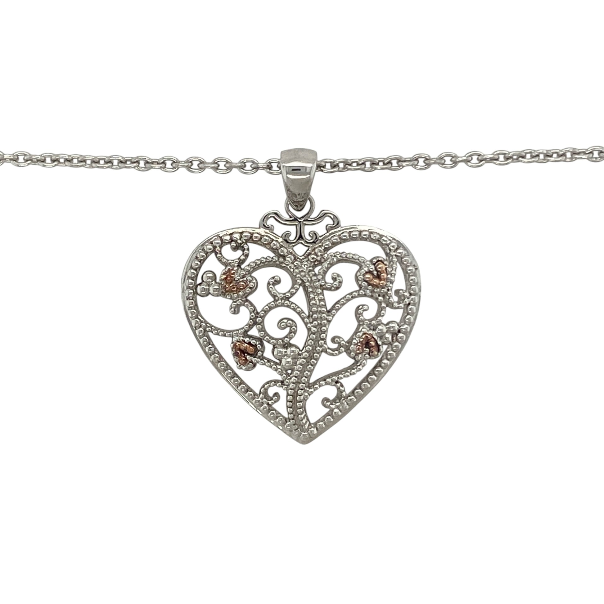 Celebrate love, family, and Welsh heritage with this pre-owned 925 silver and 9ct rose gold Clogau Tree of Life heart pendant necklace. Combining the iconic Tree of Life motif with a timeless heart design, this elegant necklace carries meaningful symbolism while offering versatile everyday style.

Design: The pendant showcases a beautiful heart-shaped design incorporating Clogau's renowned Tree of Life motif.