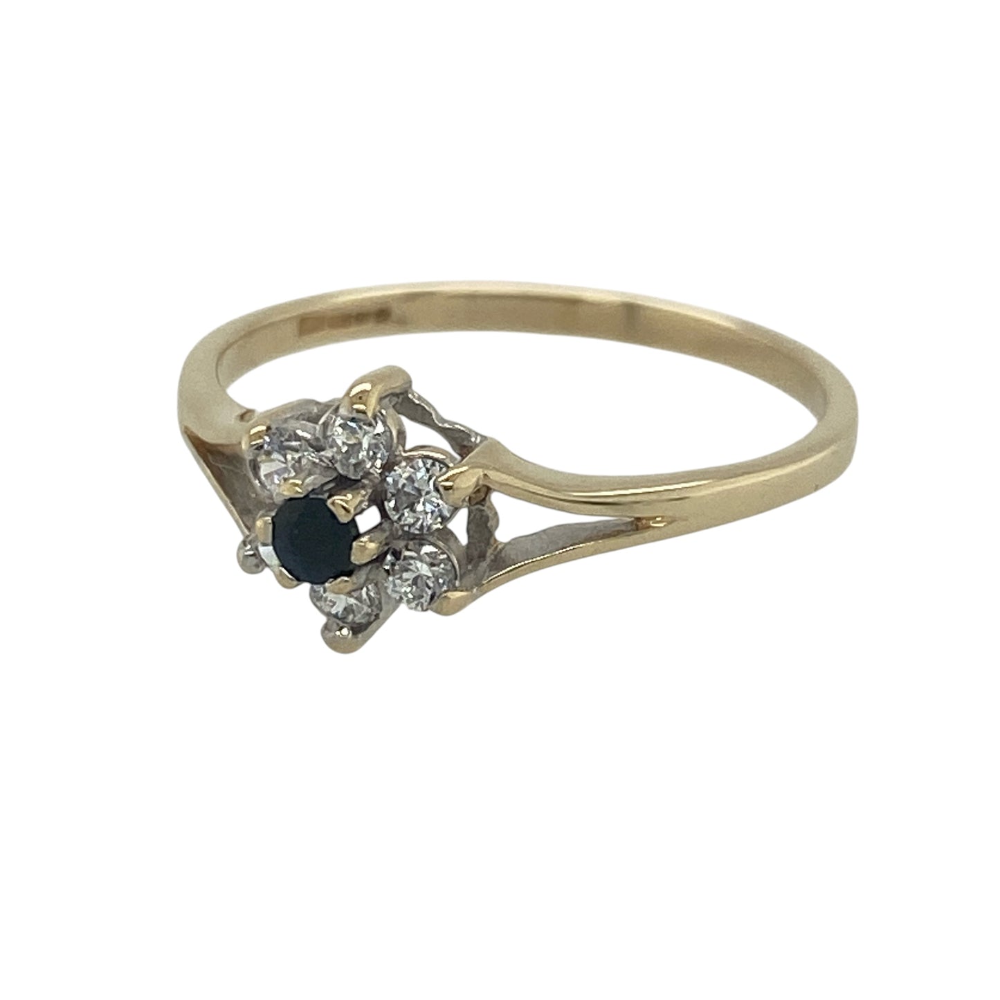 Add a touch of floral elegance and vibrant colour to your jewellery collection with this pre-owned 9ct yellow gold sapphire and cubic zirconia flower cluster ring. Featuring a delicate flower-inspired design with a rich blue sapphire centre, this charming ring offers timeless appeal and everyday wearability.

Design: The ring showcases a beautiful flower cluster design centred around a round sapphire measuring approximately 2mm in diameter.