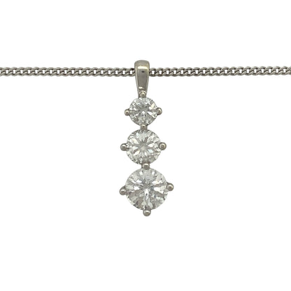 Add elegant sparkle and contemporary style to your jewellery collection with this pre-owned 9ct white gold cubic zirconia three stone drop pendant necklace. Featuring a graceful vertical arrangement of sparkling stones, this eye-catching piece offers timeless sophistication for both everyday wear and special occasions.

Design: The pendant showcases three cubic zirconia stones arranged in an elegant drop formation, creating movement and brilliance as they catch the light.
