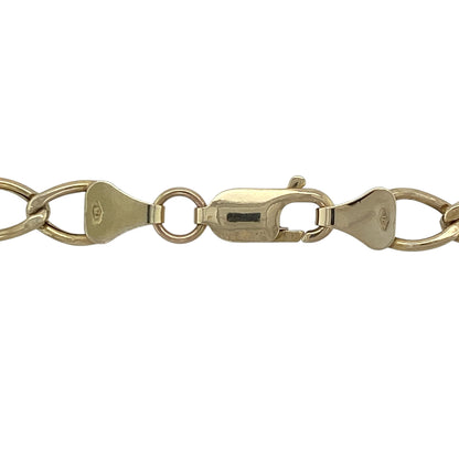 Make a stylish statement with this pre-owned 9ct yellow gold open curb chain necklace. Featuring bold open curb links and a versatile length, this classic gold chain offers timeless appeal and can be worn alone or layered with other jewellery for a contemporary look.

Design: The necklace showcases a traditional open curb link design, renowned for its distinctive interlocking pattern and enduring popularity. The generous link size creates an eye-catching appearance while maintaining a comfortable fit.