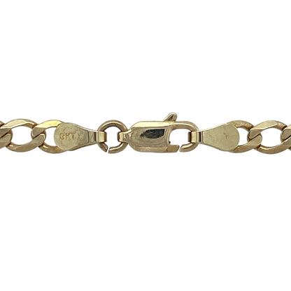 Add timeless style and versatility to your jewellery collection with this pre-owned 9ct yellow gold curb chain necklace. Featuring a longer 22-inch length, substantial gold weight, and classic curb link design, this elegant chain is perfect for everyday wear or displaying a favourite pendant.

Design: The necklace showcases the enduring curb link pattern, with smoothly interlocking links creating a sleek and polished appearance.