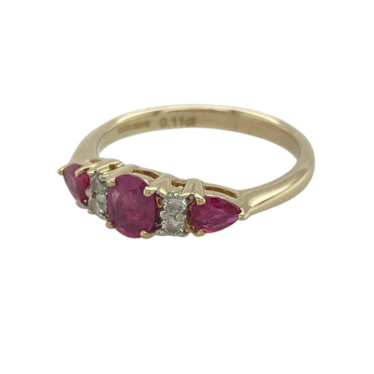 Add a vibrant splash of colour and timeless elegance to your jewellery collection with this pre-owned 9ct yellow gold diamond and ruby band ring. Featuring a beautiful arrangement of rich red rubies accented by sparkling diamonds, this eye-catching ring offers classic styling with a luxurious touch.

Design: The ring is centred by an oval ruby measuring approximately 5mm by 4mm, creating a striking focal point.