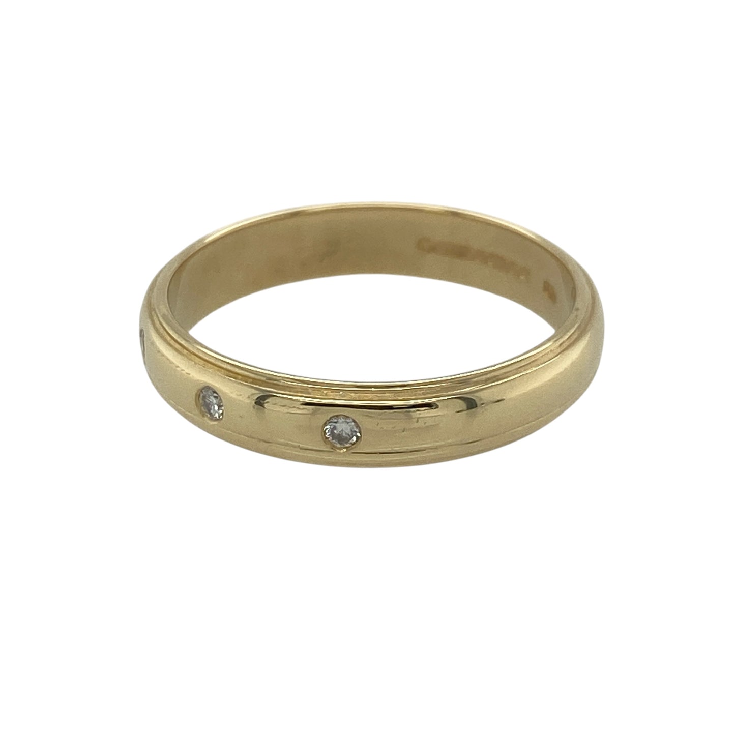 Embrace timeless elegance with this pre-owned 18ct yellow gold diamond trilogy band ring. Combining the rich warmth of 18-carat gold with the subtle sparkle of three diamonds, this classic ring offers a sophisticated and versatile design suitable for any occasion.

Design: The ring features a refined band design measuring approximately 4mm in width, set with three small diamonds across the front.