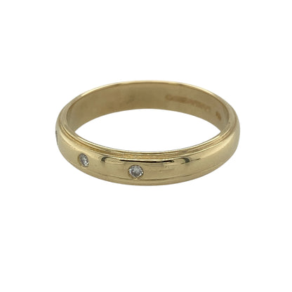 Embrace timeless elegance with this pre-owned 18ct yellow gold diamond trilogy band ring. Combining the rich warmth of 18-carat gold with the subtle sparkle of three diamonds, this classic ring offers a sophisticated and versatile design suitable for any occasion.

Design: The ring features a refined band design measuring approximately 4mm in width, set with three small diamonds across the front.