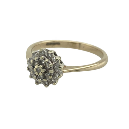 Add timeless sparkle and elegance to your jewellery collection with this pre-owned 9ct yellow gold diamond cluster ring. Featuring a classic cluster design and beautifully arranged diamonds, this attractive ring offers eye-catching brilliance and enduring appeal.

Design: The ring showcases a diamond cluster setting at the front, measuring approximately 9mm in height.