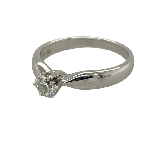 Embrace timeless elegance with this pre-owned 18ct white gold diamond solitaire ring. Featuring a sparkling brilliant-cut diamond set in luxurious white gold, this classic design showcases enduring sophistication and understated beauty.

Design: The ring centres around a single brilliant-cut diamond, expertly presented to maximise its natural sparkle and fire. The clean, elegant solitaire setting allows the diamond to take centre stage, creating a look that will never go out of style.