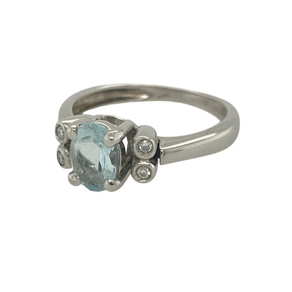 Add timeless elegance and refreshing colour to your jewellery collection with this pre-owned 18ct white gold diamond and aquamarine ring. Featuring a beautiful oval aquamarine centre stone accented by sparkling diamonds, this sophisticated ring offers a classic design with enduring appeal.

Design: The ring is centred by an oval aquamarine gemstone measuring approximately 7mm by 5mm.