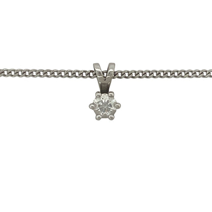 Elegant in its simplicity, this pre-owned 18ct white gold diamond solitaire pendant necklace is a timeless jewellery essential. Featuring a sparkling solitaire diamond suspended from a fine curb chain, this classic design offers understated luxury suitable for any occasion.

Design: The necklace features a delicate solitaire diamond pendant designed to showcase the beauty and brilliance of a single diamond.