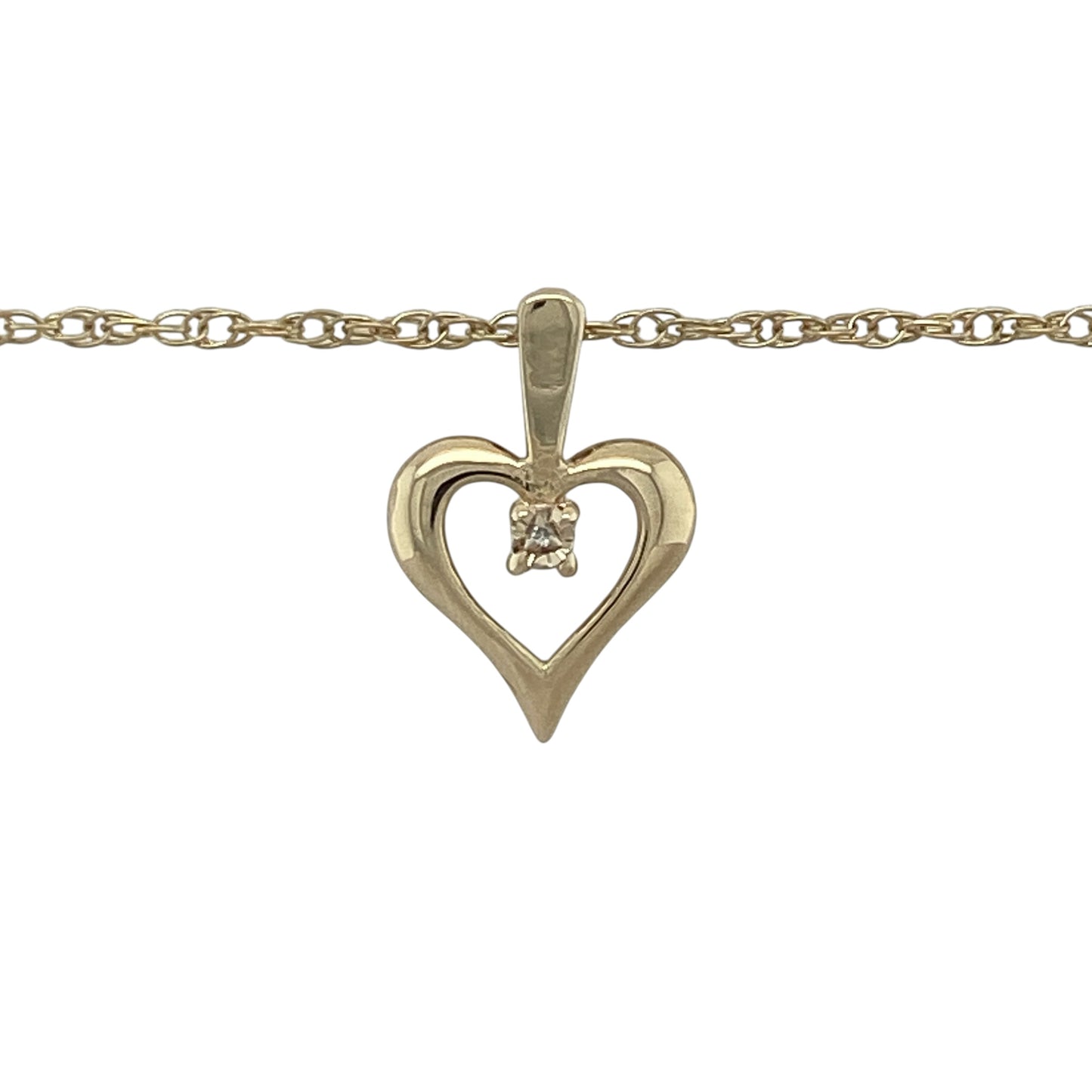 Celebrate love and elegance with this pre-owned 9ct yellow gold diamond open heart pendant necklace. Featuring a graceful open heart design accented with sparkling diamonds, this delicate necklace combines timeless symbolism with classic gold craftsmanship.

Design: The necklace showcases an elegant open heart pendant, symbolising love, affection, and cherished connections. Diamond detailing adds a touch of brilliance, enhancing the graceful curves of the heart design.
