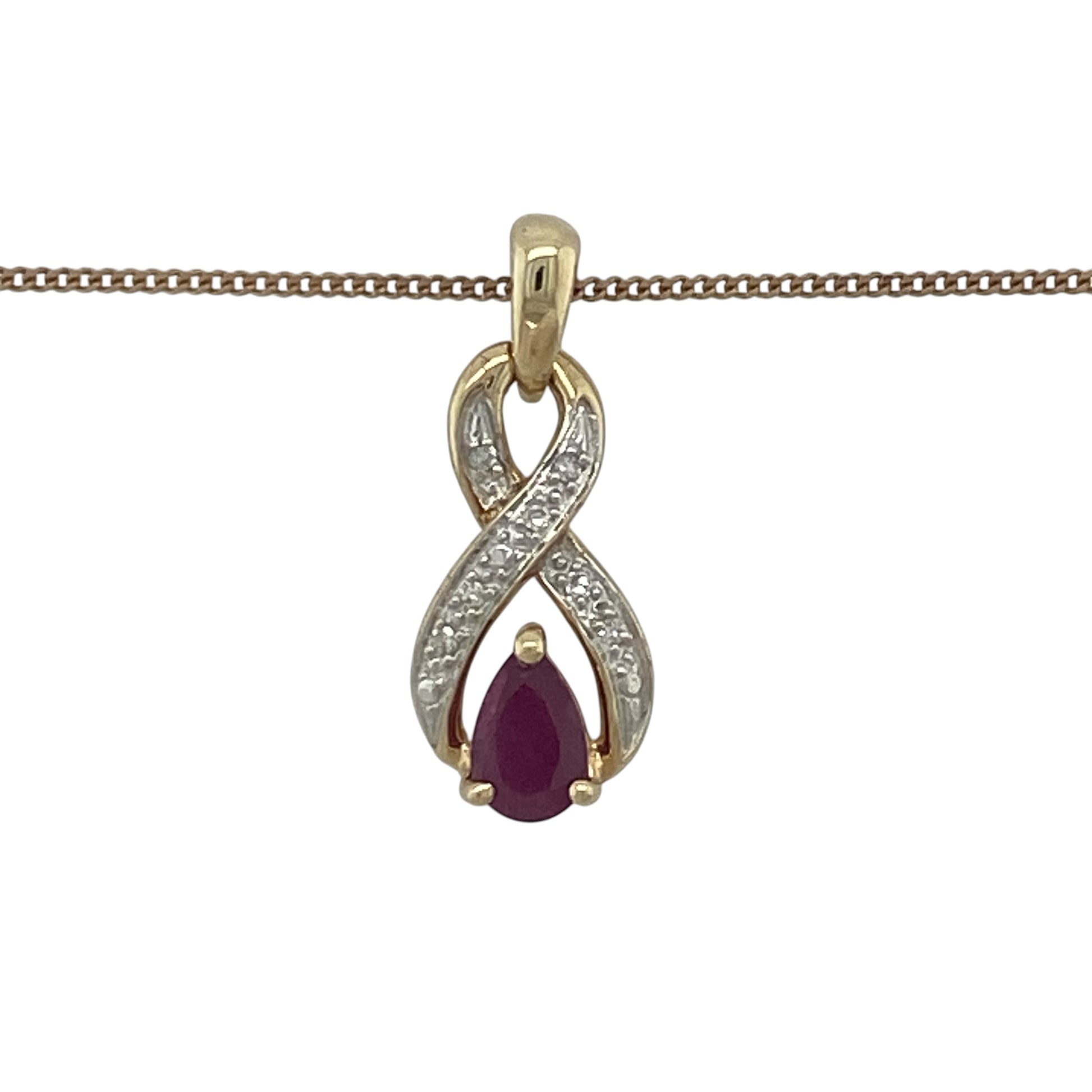 Add a touch of vibrant colour and graceful elegance to your jewellery collection with this pre-owned 9ct yellow and white gold diamond and ruby twist pendant necklace. Featuring a beautiful teardrop ruby embraced by a flowing two-tone twist design, this necklace offers timeless sophistication and eye-catching appeal.

Design: The pendant showcases an elegant twist design crafted in yellow and white gold, creating a flowing and contemporary silhouette.