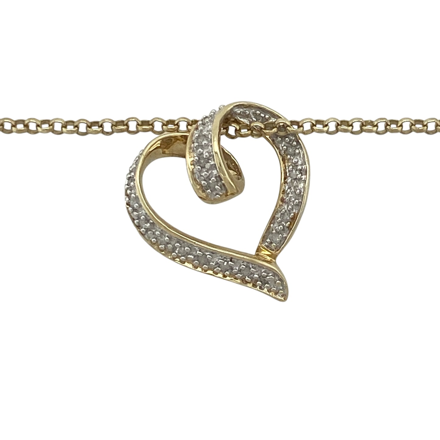 Celebrate love and timeless elegance with this pre-owned 9ct yellow and white gold diamond open heart pendant necklace. Beautifully crafted in two-tone gold and accented with sparkling diamonds, this striking piece combines romantic symbolism with sophisticated style.

Design: The necklace features an elegant open heart pendant measuring approximately 2.1cm in length.