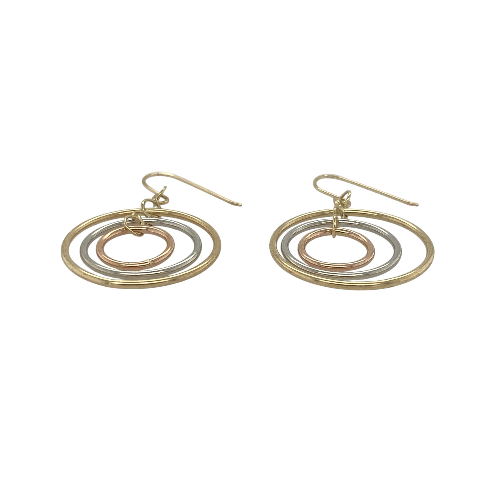 Add versatile elegance to your jewellery collection with these pre-owned 14ct yellow, rose, and white gold three circle drop earrings. Beautifully crafted in tri-colour gold, these contemporary earrings combine graceful movement with timeless styling.

Design: The earrings feature three interlinked circular drops crafted in yellow, rose, and white gold. The flowing design creates an attractive sense of movement while showcasing the distinctive beauty of each gold colour.