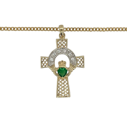Celebrate heritage, faith, and love with this pre-owned 9ct yellow gold emerald-coloured heart stone and cubic zirconia Celtic Claddagh cross pendant necklace. Combining meaningful Celtic symbolism with sparkling details, this striking piece makes a beautiful and distinctive addition to any jewellery collection.

Design: The pendant features an intricate Celtic Claddagh cross design, incorporating traditional Celtic knotwork alongside the iconic Claddagh symbol of love, loyalty, and friendship.