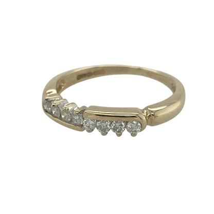Add classic sparkle and timeless elegance to your jewellery collection with this pre-owned 9ct yellow gold diamond band ring. Featuring a sleek diamond-set design with an impressive total diamond weight, this beautiful ring is perfect for everyday wear or special occasions.

Design: The ring showcases a refined band design with a diamond-set front measuring approximately 3mm in width.