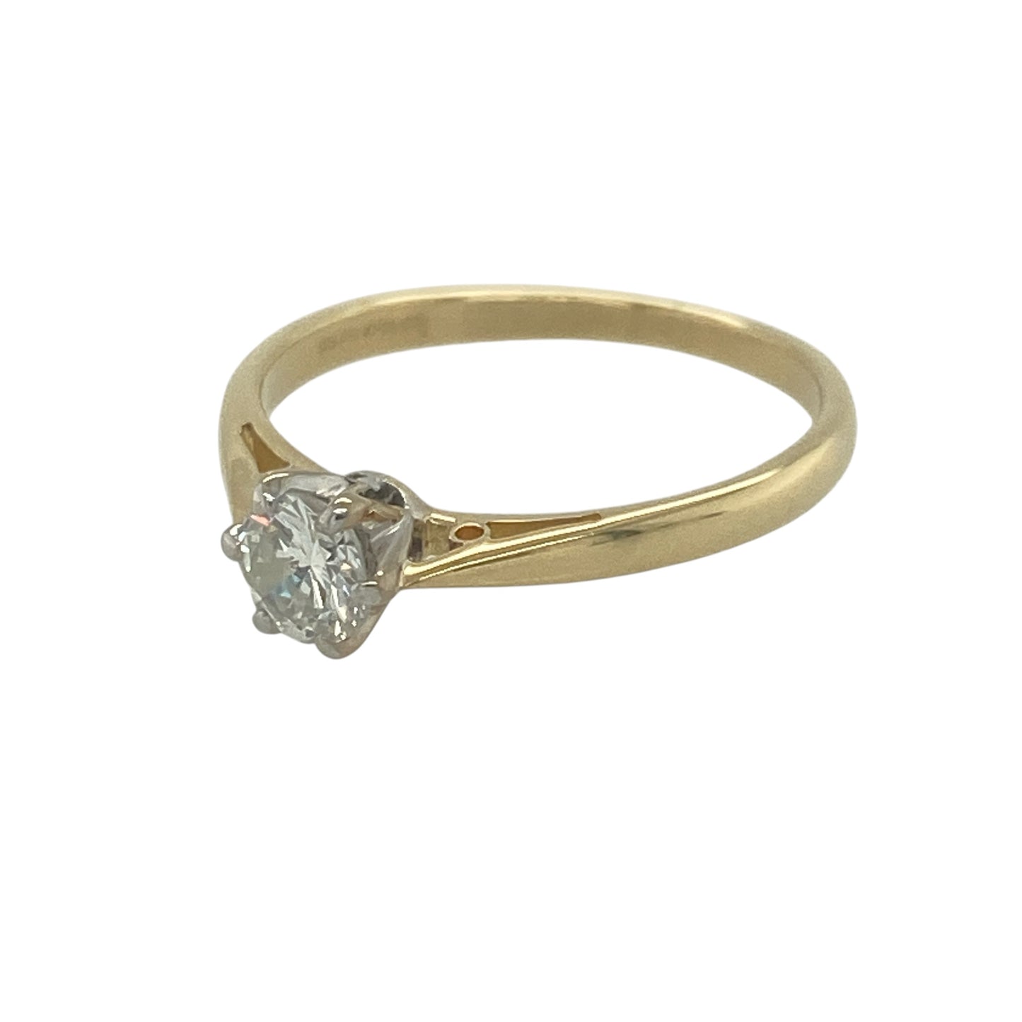 Timeless and elegant, this pre-owned 18ct yellow gold diamond solitaire ring is a classic piece that beautifully showcases the natural brilliance of a single diamond. With its refined design and luxurious gold setting, this ring is a wonderful choice for any jewellery collection.

Design: The ring features a traditional solitaire setting, allowing the diamond to take centre stage.