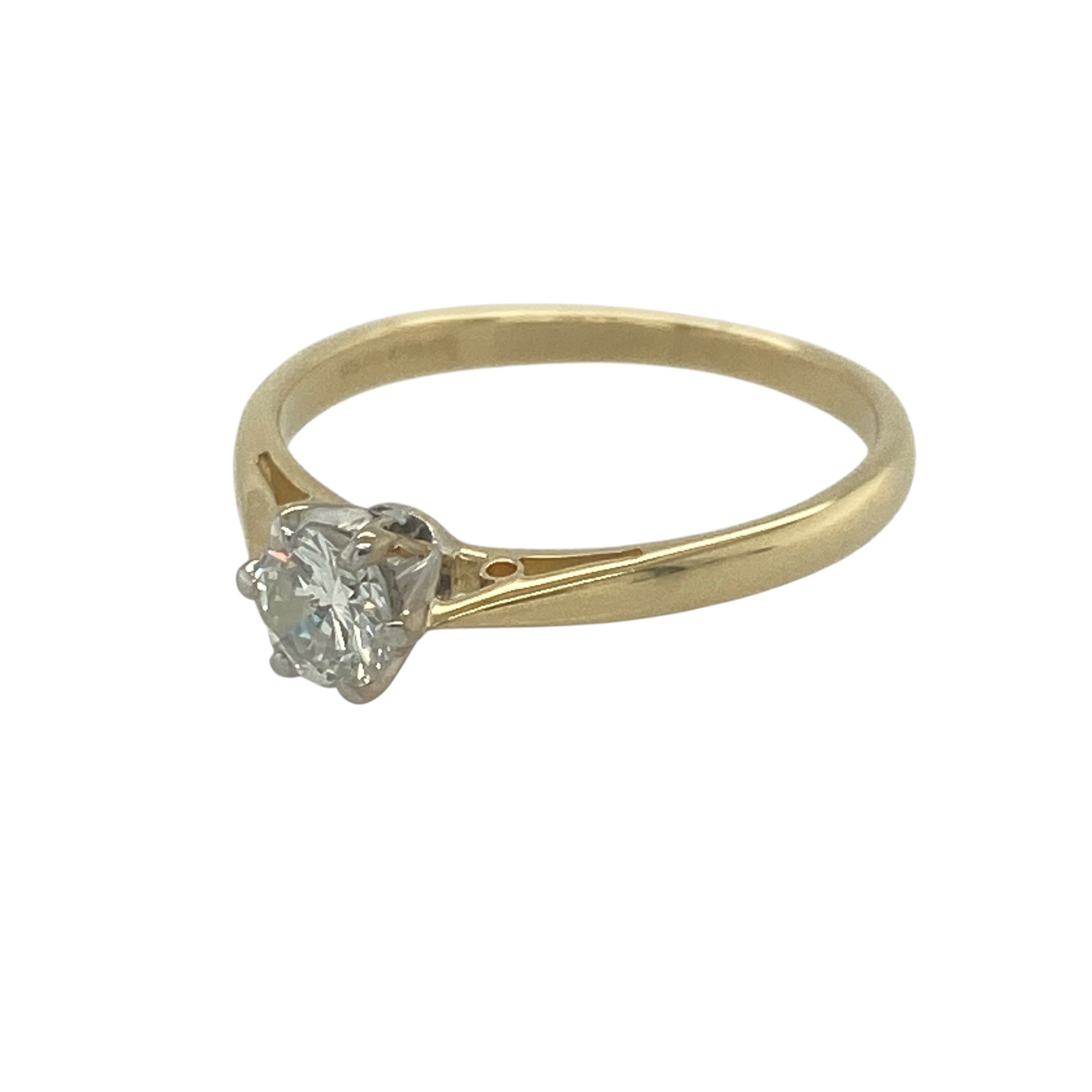 Timeless and elegant, this pre-owned 18ct yellow gold diamond solitaire ring is a classic piece that beautifully showcases the natural brilliance of a single diamond. With its refined design and luxurious gold setting, this ring is a wonderful choice for any jewellery collection.

Design: The ring features a traditional solitaire setting, allowing the diamond to take centre stage.