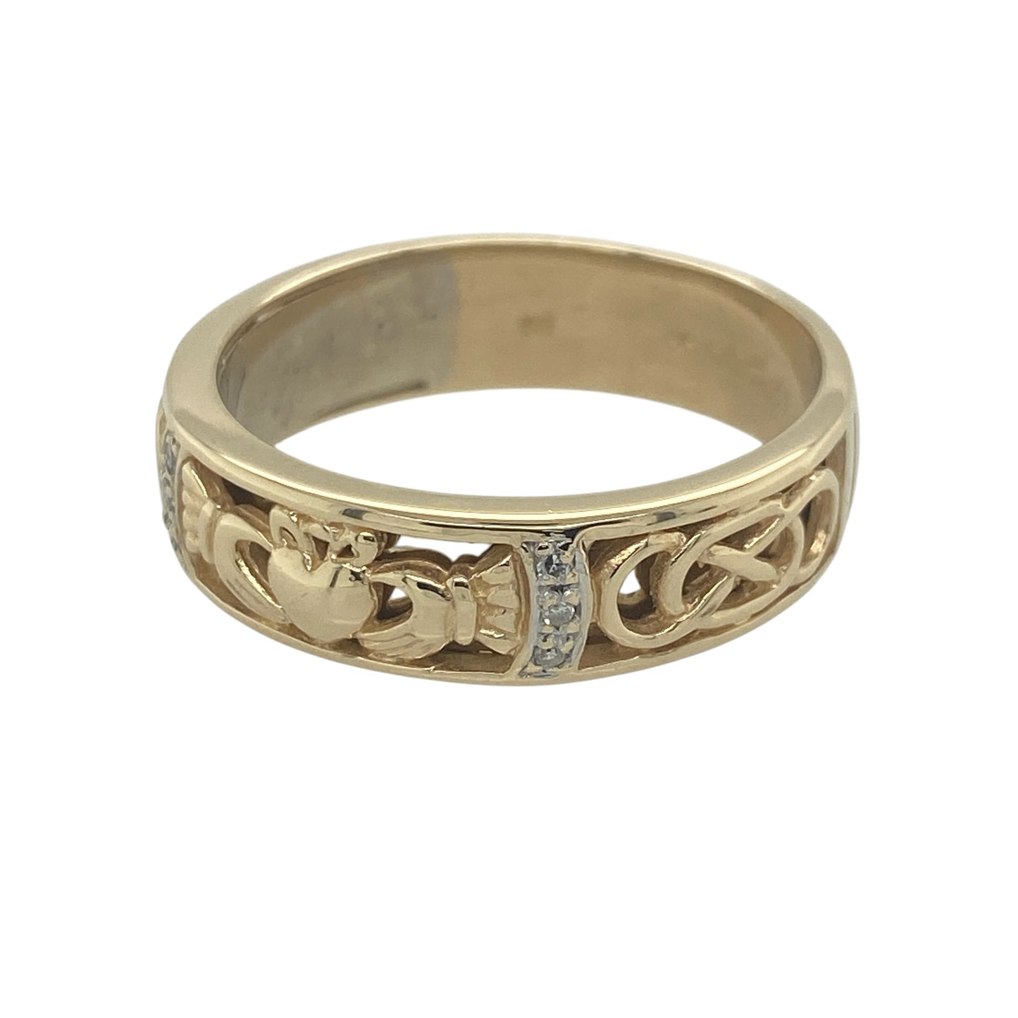 Celebrate love, loyalty, and friendship with this pre-owned 9ct yellow gold diamond Celtic Claddagh band ring. Combining traditional Irish symbolism with elegant diamond detailing, this substantial ring is both meaningful and stylish.

Design: The ring features a beautifully crafted Celtic Claddagh design incorporated into a wide band. The iconic Claddagh motif, representing love (the heart), loyalty (the crown), and friendship (the hands)