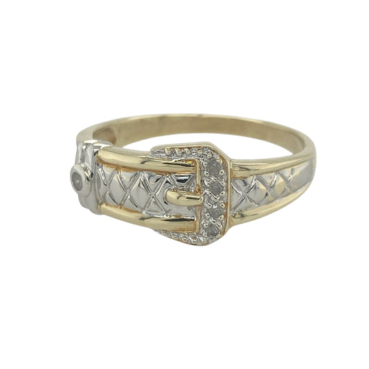 Make a bold statement with this pre-owned 9ct yellow and white gold diamond buckle ring. Combining a classic buckle motif with elegant two-tone gold styling and sparkling diamond accents, this distinctive ring offers both symbolic meaning and timeless appeal.

Design: The ring features an eye-catching buckle design across the front, measuring approximately 10mm in height. The buckle motif is a traditional symbol of strength, loyalty, and enduring commitment, making this piece both meaningful and stylish.