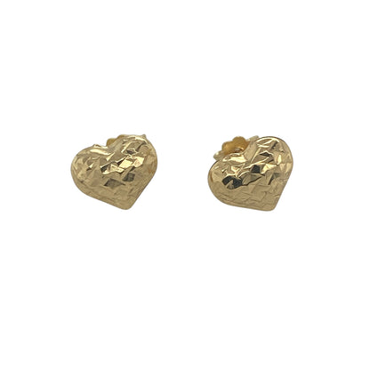 Add a touch of romantic charm to your jewellery collection with these pre-owned 9ct yellow gold patterned heart stud earrings. Beautifully crafted with decorative detailing, these elegant earrings offer timeless style and meaningful symbolism.

Design: The earrings feature a classic heart-shaped design enhanced with an attractive patterned finish. The decorative detailing adds texture and visual interest, giving the earrings a distinctive appearance while maintaining their elegant and feminine appeal.