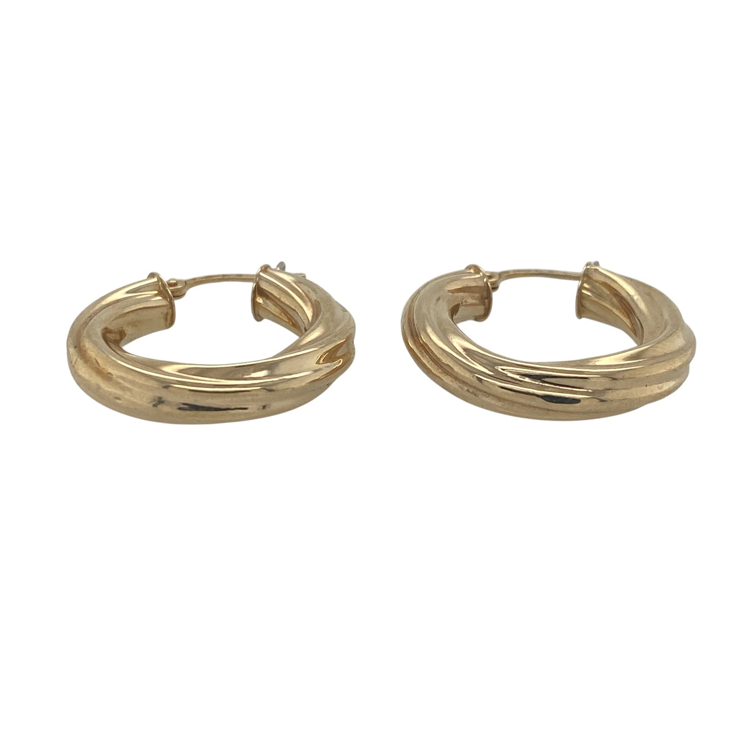 A timeless jewellery essential, these pre-owned 9ct yellow gold twisted hoop creole earrings combine classic styling with elegant detailing. Their graceful twisted design adds texture and visual interest, making them a versatile addition to any jewellery collection.

Design: The earrings feature a traditional hoop creole design enhanced by an attractive twisted profile. The flowing twist creates a beautiful interplay of light across the surface, adding depth and sophistication to the classic hoop style.