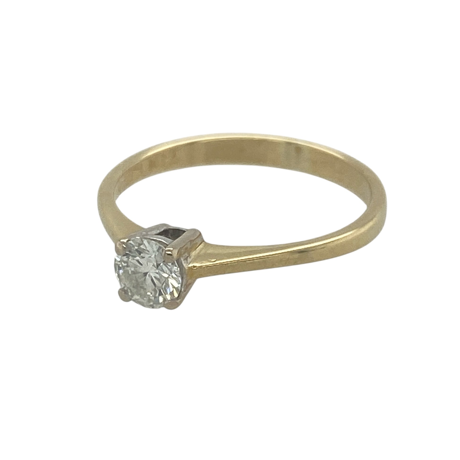 Elegant, timeless, and beautifully understated, this pre-owned 18ct yellow gold diamond solitaire ring is a classic symbol of enduring style and sophistication. Showcasing a sparkling brilliant cut diamond in a traditional solitaire setting, this ring is perfect for marking a special occasion or adding a touch of luxury to everyday wear.

Design: The ring features a classic solitaire design, allowing the beauty and brilliance of the diamond to take centre stage.