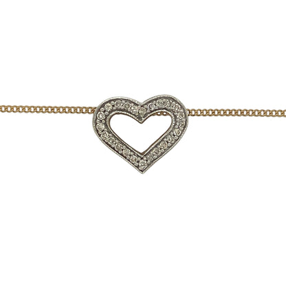 A beautiful symbol of love and affection, this pre-owned 9ct yellow gold diamond open heart pendant necklace combines timeless elegance with delicate sparkle. Featuring a classic heart design accented with diamonds, this necklace is perfect for everyday wear or as a meaningful gift for someone special.

Design: The necklace features an elegant open heart pendant measuring approximately 16mm by 13mm.
