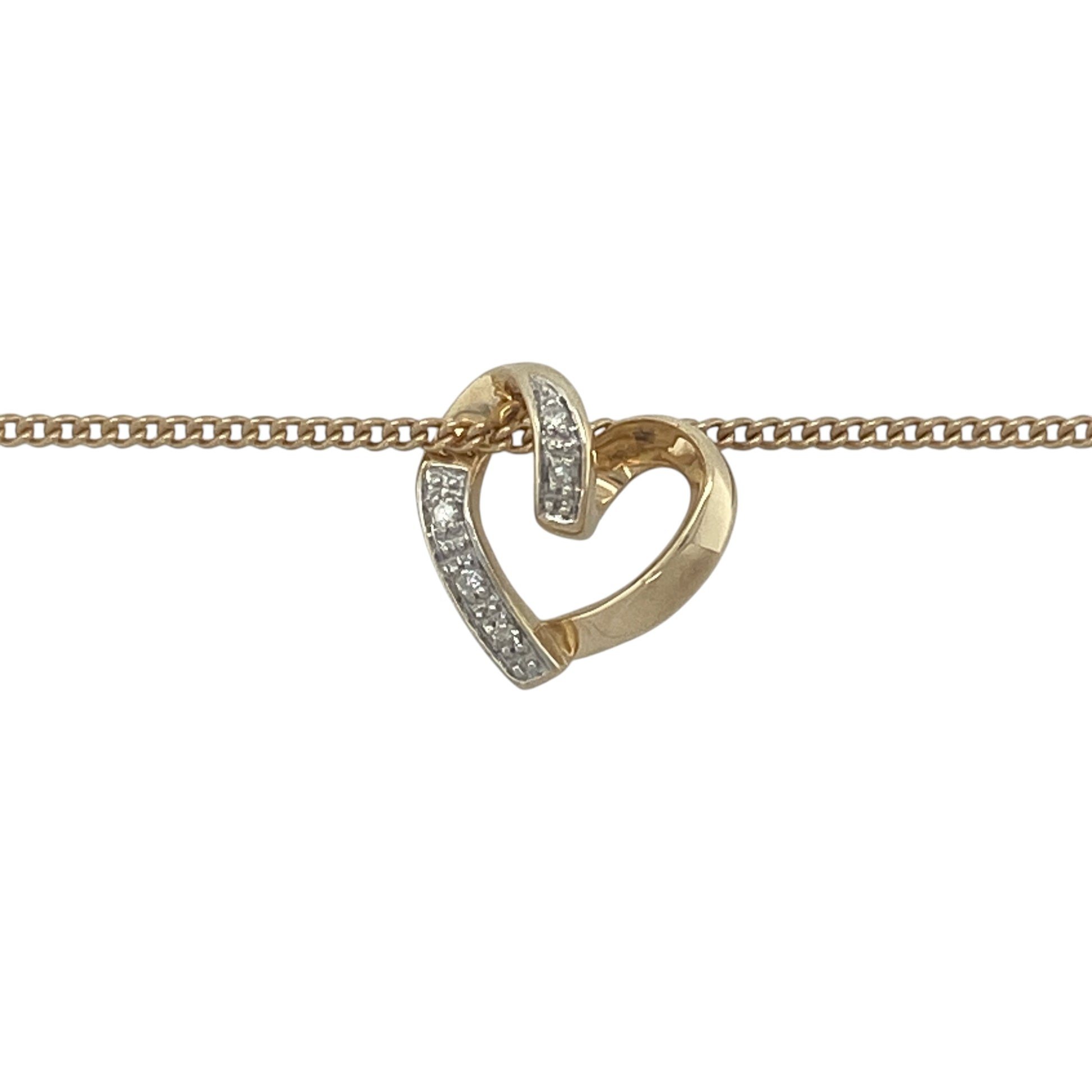 Delicate, elegant, and full of meaning, this pre-owned 9ct yellow gold diamond open heart pendant necklace is a timeless expression of love and affection. Featuring a graceful heart design accented with sparkling diamonds, this necklace is perfect for everyday wear or as a thoughtful gift for a special occasion.

Design: The necklace features a beautifully crafted open heart pendant measuring approximately 12mm by 13mm.