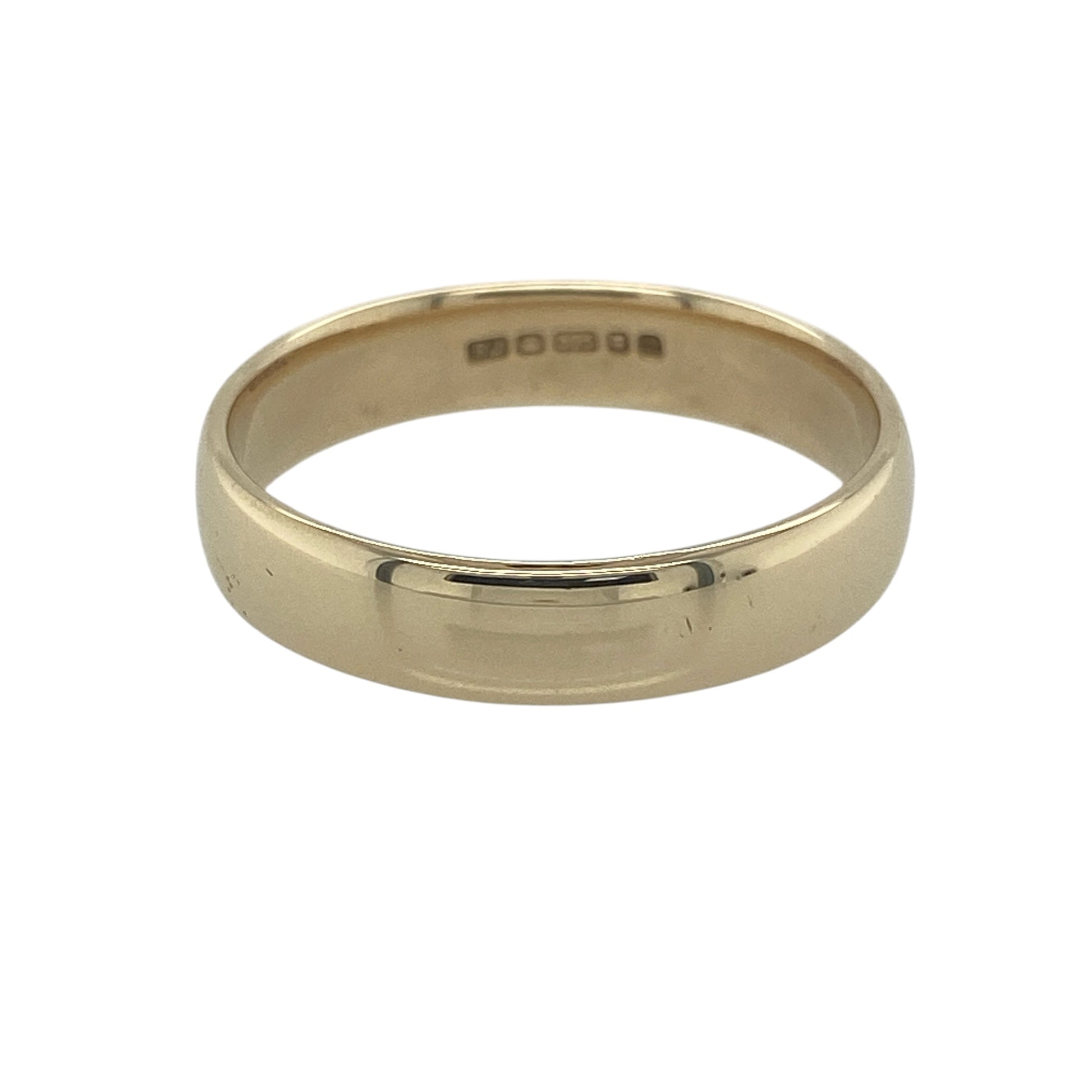 Classic, timeless, and beautifully crafted, this pre-owned 9ct yellow gold wedding band ring is a traditional symbol of love and commitment. With its wider profile and polished finish, it offers enduring style and comfortable everyday wear.

Design: The ring features a classic wedding band profile with a smooth, polished finish and clean, understated lines. Measuring approximately 5mm in width, it provides a noticeable yet refined appearance that never goes out of fashion.