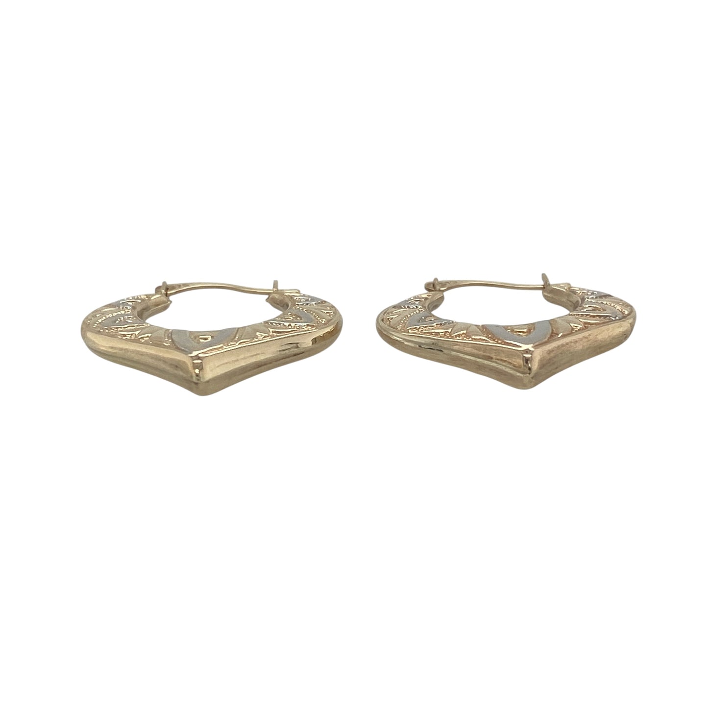Delicate and stylish, these pre-owned 9ct yellow and white gold patterned heart creole earrings beautifully combine two-tone gold with a romantic heart-shaped design. Their elegant detailing and lightweight feel make them a charming addition to any jewellery collection.

Design: The earrings feature a graceful heart-shaped creole design enhanced with an attractive patterned finish.